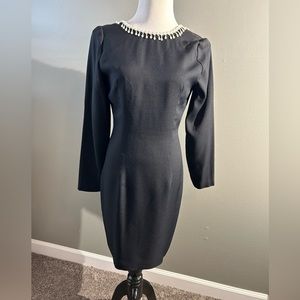 Depeche Mode size for black dress with pearl‎ accent at neck